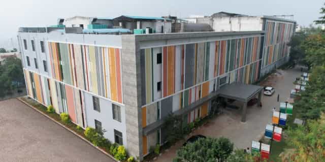 Apollo Institute of Medical Sciences and Research, Hyderabad — elevated view of the college building at Apollo Health City, Jubilee Hills