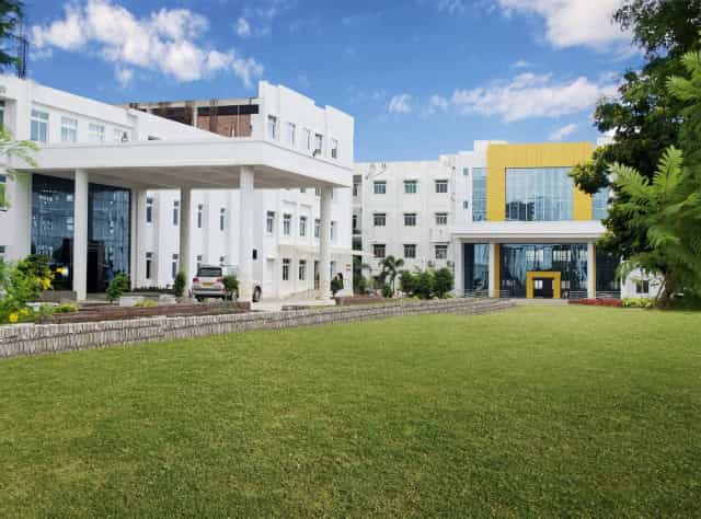 Main building of Dr. Patnam Mahender Reddy Institute of Medical Sciences at Chevella, Rangareddy, with the hospital block behind