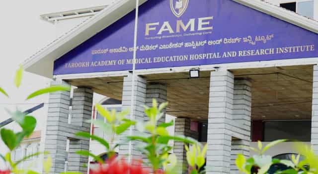 Entrance portico of Farookh Academy of Medical Education Hospital and Research Institute, Mysore, with bilingual FAME signage