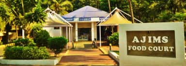 AJIMS Food Court block with laundry and stationery counters on the Mangalore campus