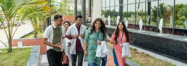 MBBS students walking outside the Ananya College of Medicine & Research building, Kalol