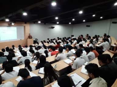 MBBS students in a tiered 180-seat lecture hall at Bharati Vidyapeeth Medical College, Pune
