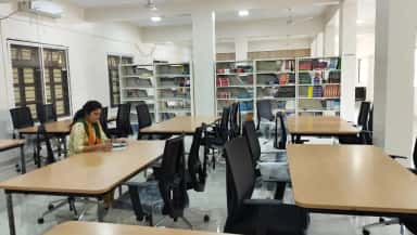 Reading hall and book stacks of the central library at BAVMC Pune