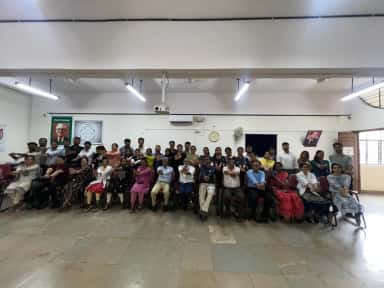 Faculty members at a curriculum development workshop in a seminar room, Dr. B.R. Ambedkar Medical College, Bengaluru