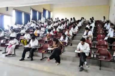 Students in the tiered lecture hall at Dr. B.R. Ambedkar Medical College, Bengaluru