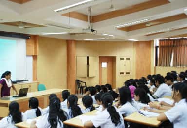 A lecture in progress in a tiered lecture hall at Dr. D. Y. Patil Medical College, Pimpri