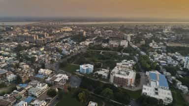 Aerial view of Dr. Kiran C. Patel Medical College and its General Hospital at Bharuch with the Narmada river road-rail bridge in the background