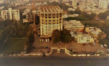 Aerial front view of the New Civil General Hospital, the teaching hospital of Dr. Kiran C. Patel Medical College, Bharuch, with ongoing expansion