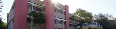 Wide view of the Dr. Vasantrao Pawar Medical College building at Adgaon, Nashik