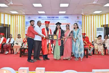 Graduation ceremony on stage at the Medical College and Hospital, Ahilyanagar, with a graduate receiving her degree