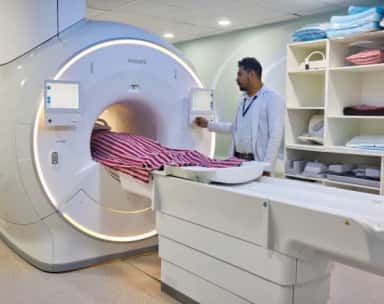 Radiographer operating the MRI scanner suite at the Father Muller campus in Kankanady, Mangalore