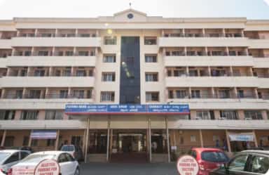 Ward block of Father Muller Medical College Hospital with Fathima Ward and Asha Kiran signage, Kankanady