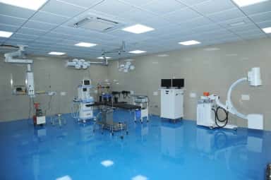 Operation theatre with a C-arm mobile X-ray imaging unit at Indira Medical College & Hospitals teaching hospital