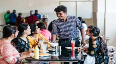 Students having lunch in the campus cafeteria at K S Hegde Medical Academy, Mangalore
