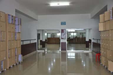 Central Library entrance with student lockers at Kanachur Institute of Medical Sciences