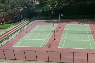 Outdoor tennis courts on the Manipal campus