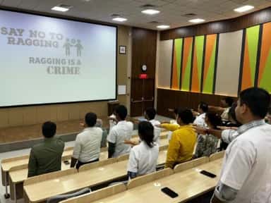 Lecture hall during a student anti-ragging awareness session at Kiran Medical College, Surat