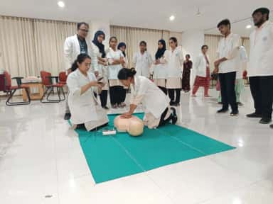 Students practising CPR on a manikin during ECLS skill-lab training at Mahadevappa Rampure Medical College Kalaburagi
