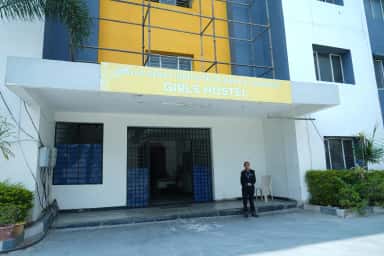 Girls' hostel block of Malla Reddy Institute of Medical Sciences with the college name on the entrance board