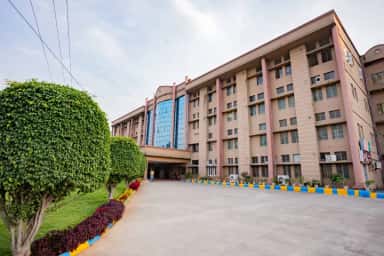 Driveway and landscaped approach to the Mediciti Institute of Medical Sciences college building at Ghanpur