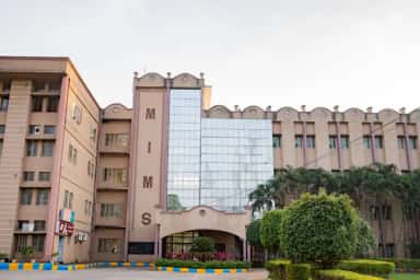 Academic block of Mediciti Institute of Medical Sciences with MIMS lettering on the facade tower