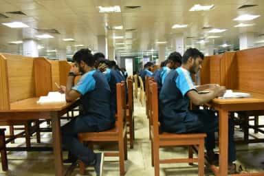 MBBS students studying at cubicle desks in the central library of Meenakshi Medical College, Kanchipuram