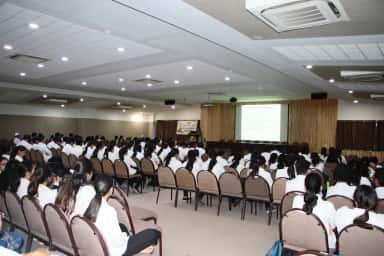 MBBS students in white coats filling a department auditorium during a Department of Paediatrics lecture at MGM Medical College, Aurangabad