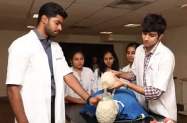Students practising airway management on a manikin at the Advanced Learning Centre, Ramaiah Medical College