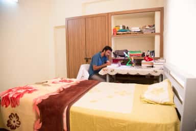 Furnished single hostel room with study desk at the Navodaya campus