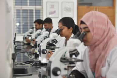 MBBS students using microscopes during a histology practical at Neelima Institute of Medical Sciences, Ghatkesar