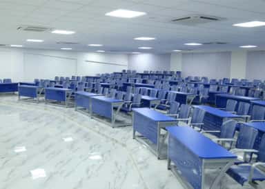 Tiered lecture hall with desks at Panimalar Medical College Hospital & Research Institute, Chennai