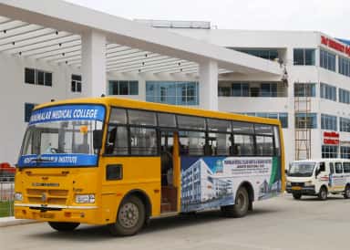 College bus branded Panimalar Medical College Hospital & Research Institute, Jaisakthi Educational Trust, outside the campus at Poonamallee, Chennai