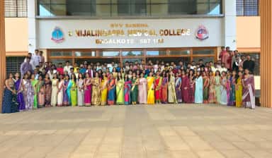 MBBS students gathered before the B.V.V. Sangha S. Nijalingappa Medical College entrance signage at Bagalkote
