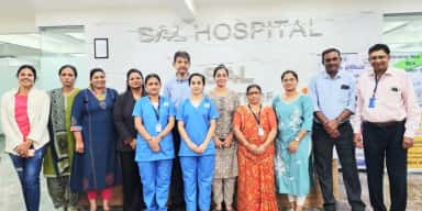 Faculty and staff at the SAL Hospital reception, SAL Institute of Medical Sciences, Ahmedabad
