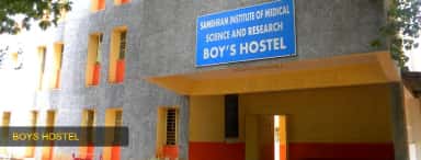 Boys' hostel of Sambhram Institute of Medical Science and Research, KGF, with its name board over the entrance (archived college photo, 2024)