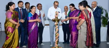 Faculty lighting the ceremonial lamp at the Anatomy Day celebration, SDM Medical College Dharwad