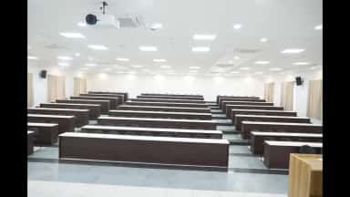 Tiered lecture hall with benches at Siddaganga Medical College and Research Institute
