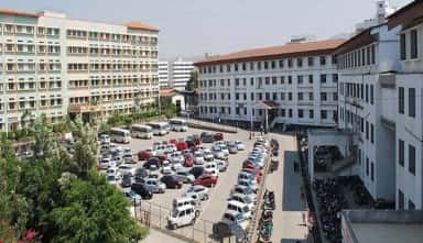 Wide view of the Smt. Kashibai Navale Medical College and General Hospital campus buildings and parking at Narhe, Pune