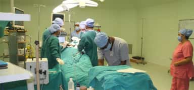 Surgical team at work in an operating theatre of Smt. Kashibai Navale General Hospital, Narhe