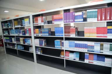Central library book stacks at Sri Chamundeshwari Medical College, Channapatna