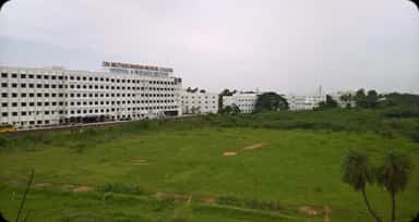 Distant view of the Sri Muthukumaran Medical College campus and teaching hospital block at Chikkarayapuram, Chennai