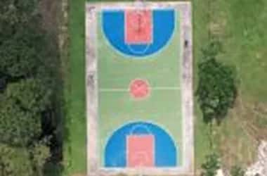 Aerial view of the basketball and sports court on the Sri Muthukumaran Medical College campus, Chennai