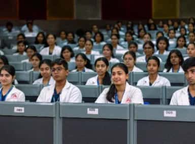 Tiered lecture theatre filled with MBBS students at Sri Ramachandra Medical College, Chennai