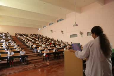 MBBS students in a tiered lecture theatre at Sri Siddhartha Medical College, Tumkur