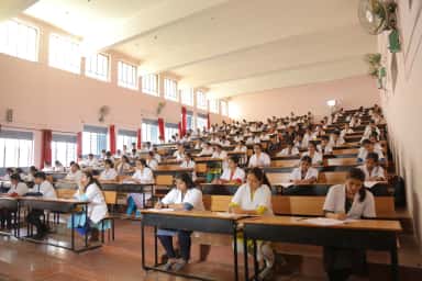 Students attending a session in a gallery lecture hall at Sri Siddhartha Medical College, Tumkur