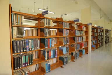 Book stacks in the central library of Sri Siddhartha Medical College, Tumkur