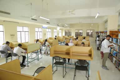 Students at reading carrels in the library of Sri Siddhartha Medical College, Tumkur