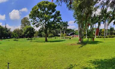Lawns and trees on the 250-acre green campus of Sri Siddhartha Medical College, Tumkur