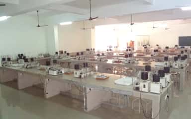 Practical laboratory benches with teaching equipment at Srinivas Institute of Medical Sciences, Mangalore
