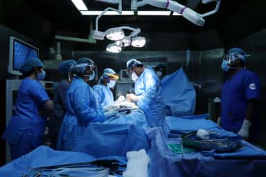 Surgical team in a modular operation theatre at SRM Medical College Hospital and Research Centre